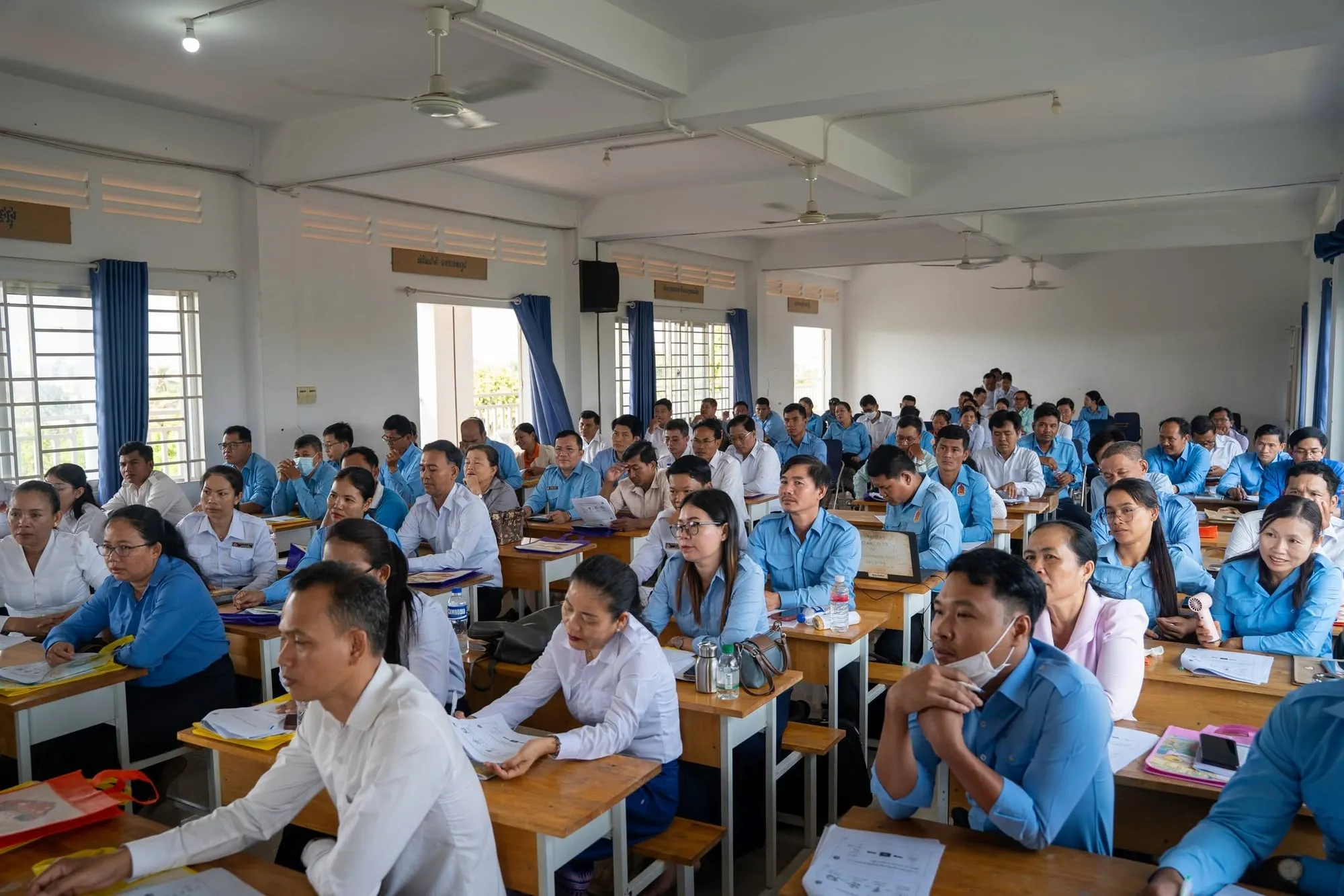 Participants seated at their desks in the seminar hall